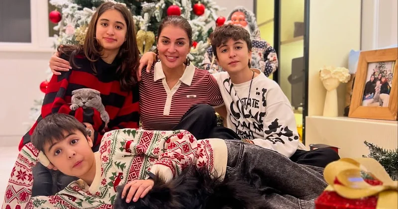 Sevincdən övladları ilə Yeni il fotosu