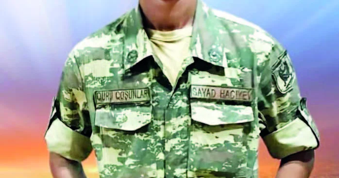 Gülüşü yanağında nur saçan oğul