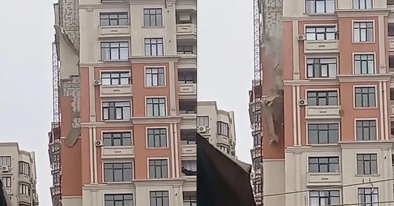 Bakıda TƏHLÜKƏLİ ANLAR Güclü külək binanın fasadını UÇURTDU
