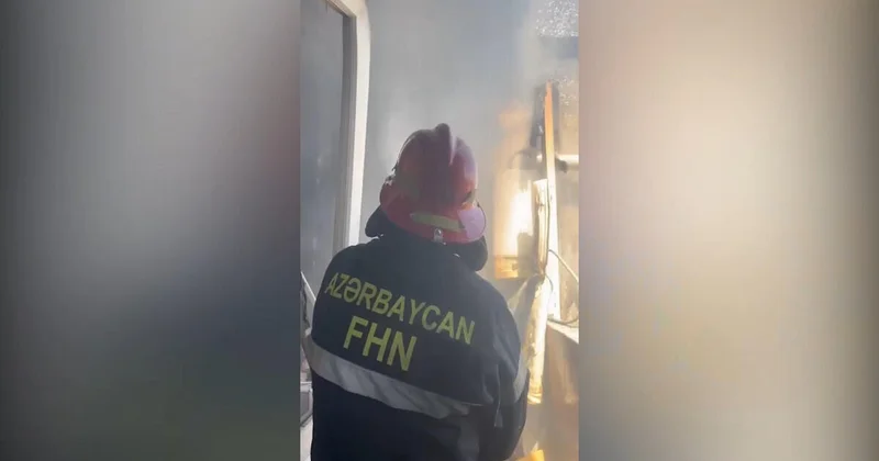 В Баку в жилом доме произошел пожар, эвакуированы 12 человек ВИДЕО