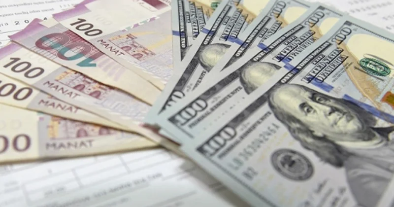 Dollar dəyər itirir, qızıl bahalaşır: Bəs manat?