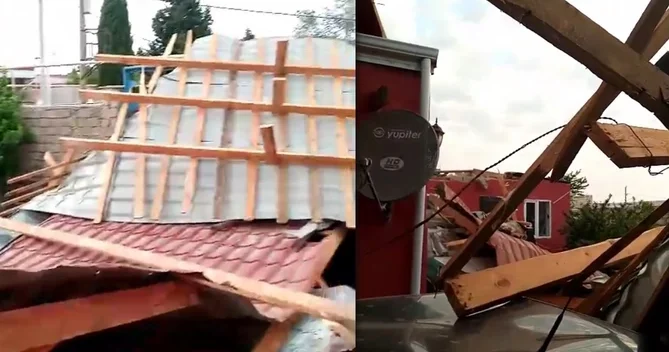 Bakıda güclü külək dam örtüyünü uçurtdu Evlərə və maşınlara ziyan dəydi