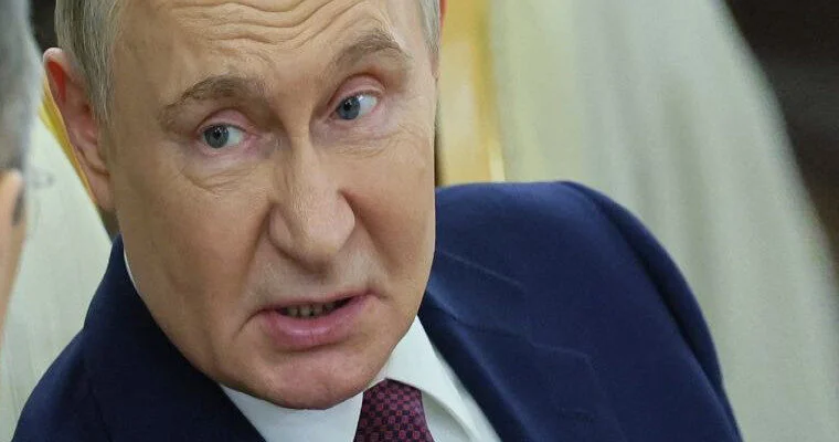 Almaniya kansleri: Putin zəmanəmizin ən təhlükəli hərbi cinayətkarıdır