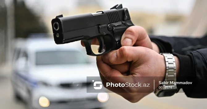 Gürcüstanda Marneuli bazarında ata və oğul güllələndilər