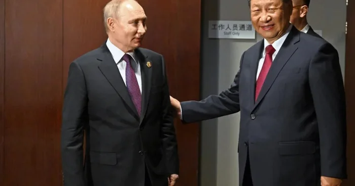 Putin çinli həmkarı ilə danışıb