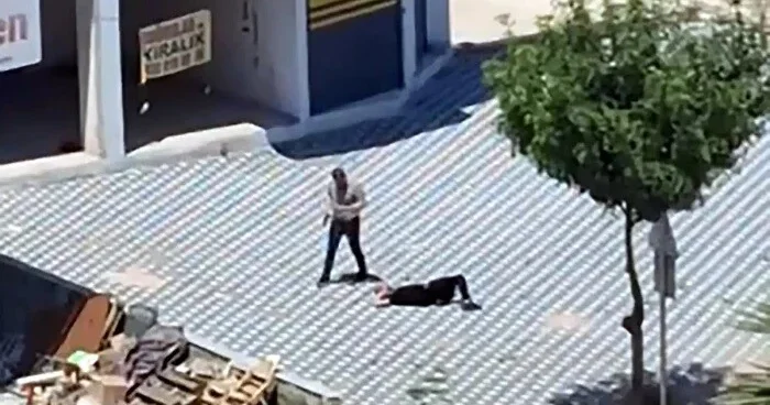 Polis məmuru oğlunu güllələdi, başında gözlədi Video