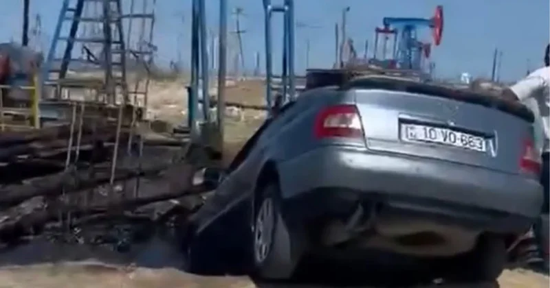 Bakıda avtomobil neft quyusuna düşdü Video