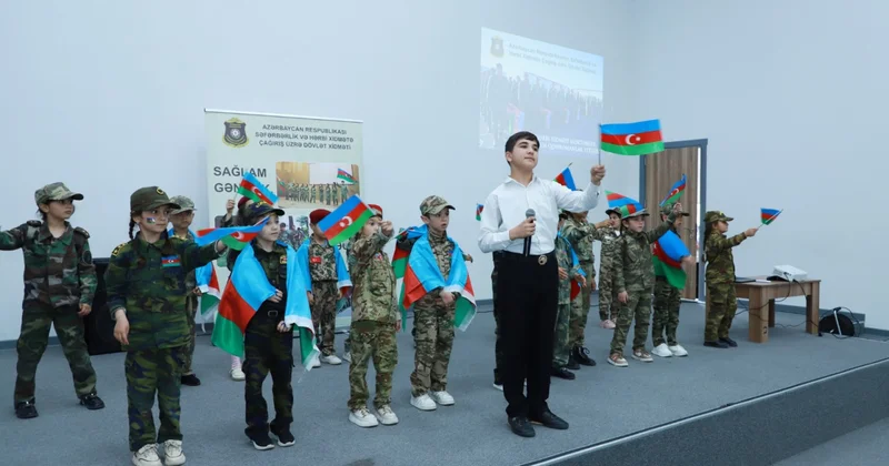 Шамкирцы получили заряд патриотизма от Госслужбы фото