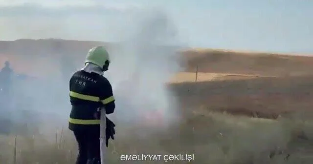 Пожар на зерновом поле в Газахе ВИДЕО