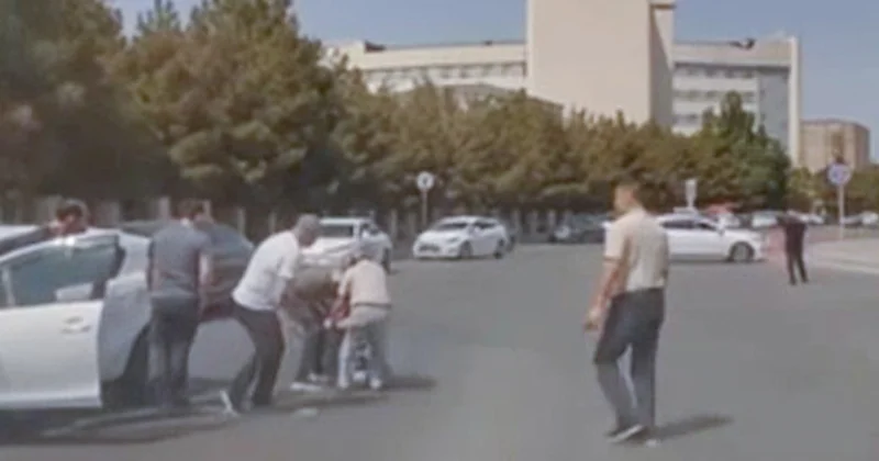 Maşınla vurulan qadın yolun ortasında qaldı, sürücünü döydü Video