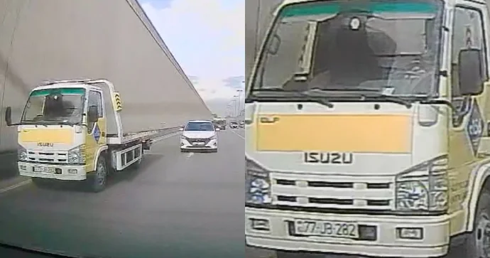 Başı telefona qarışan sürücü evakuatoru öz kefiylə sürdü VİDEO