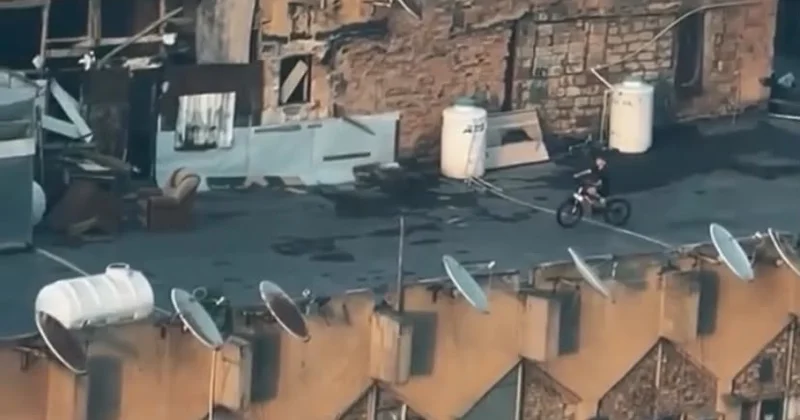 Azyaşlı binanın damında velosiped sürdü Polis araşdırmaya başladı VİDEO