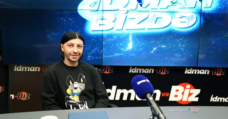 Bakıda pəncərə silən qadın futbolçunun diqqətini çəkdi VİDEO