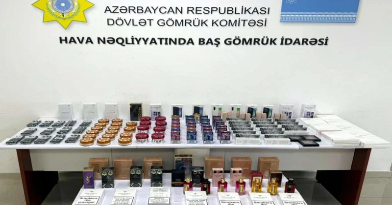 Mallarını gömrükdən keçirmək məqsədilə sərnişinlərə payladı YAXALANDI