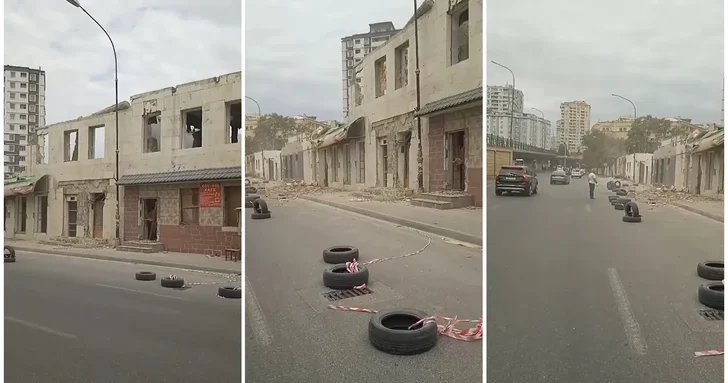Опасный снос: в центре Баку демонтаж здания угрожает безопасности водителей