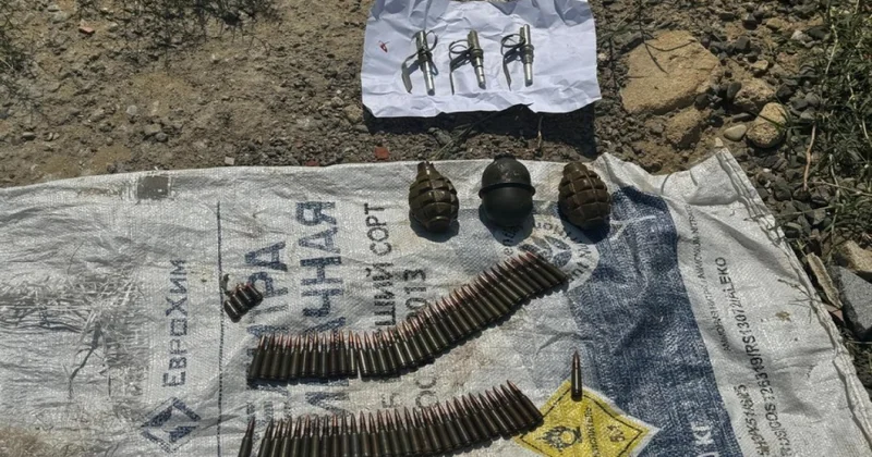 В Абшеронском районе обнаружен тайник с оружием и боеприпасами ВИДЕО