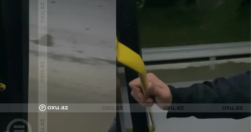 142 nömrəli avtobusda təhlükəli anlar: Sürücü sıxlıqda açıq qapı ilə hərəkət etdi Video