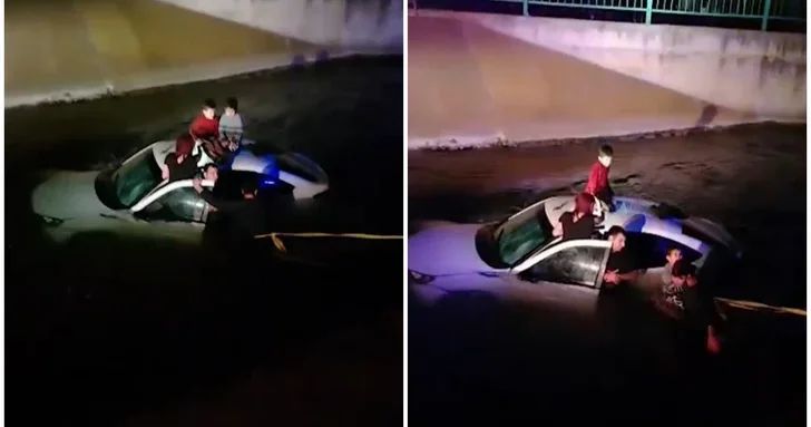 В Бейлагане спасатели МЧС вытащили из упавшего в водоканал автомобиля четырех человек