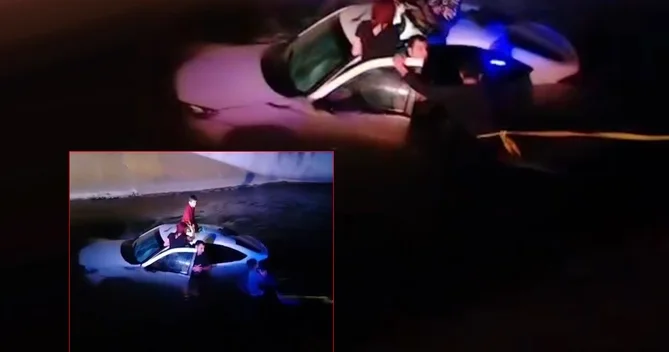 Avtomobil kanala aşdı: İkisi azyaşlı olmaqla dörd nəfərin XİLASEDİLMƏ GÖRÜNTÜLƏRİ