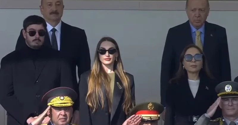 Prezidentin oğlu ilə gəlini hərbi paradda Foto
