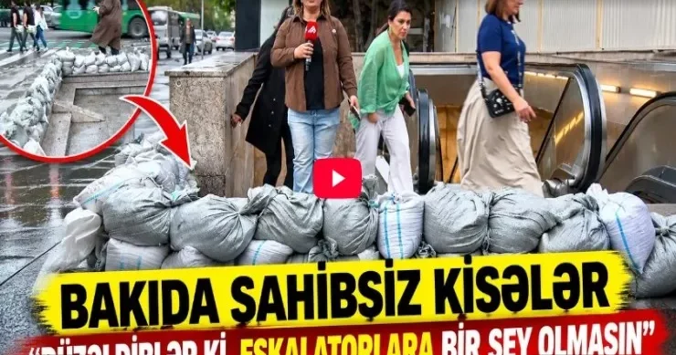 Bakıda keçidin qarşısına kisələr yığıldı VİDEO