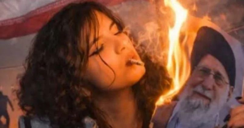 Xameneinin fotosuna od vurub, siqaret yandırdılar FOTO