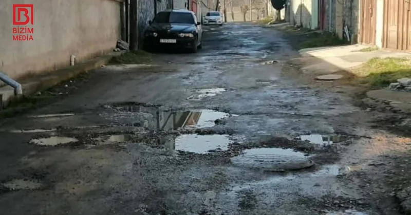 Şəki sakinlərinin yol PROBLEMİ: Bu küçədə piyada və maşınlar çətin vəziyyətdə FOTO