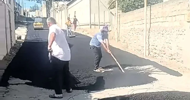 Bakıda ilginc olay: Xanımına ehsan vermək əvəzinə yolu asfaltladı VİDEO
