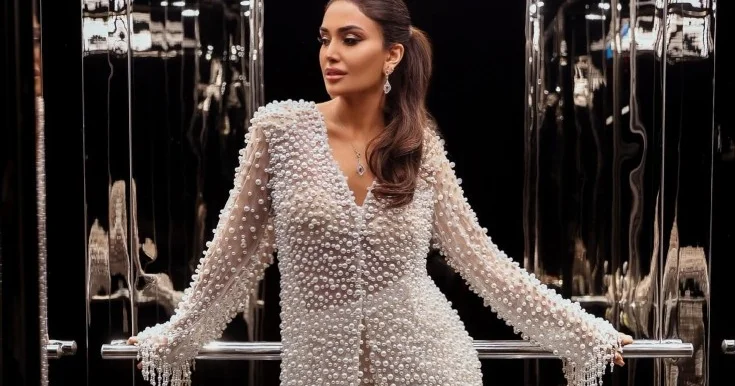 Pərvinin mirvarilərlə bəzədilmiş geyimi Fotolar