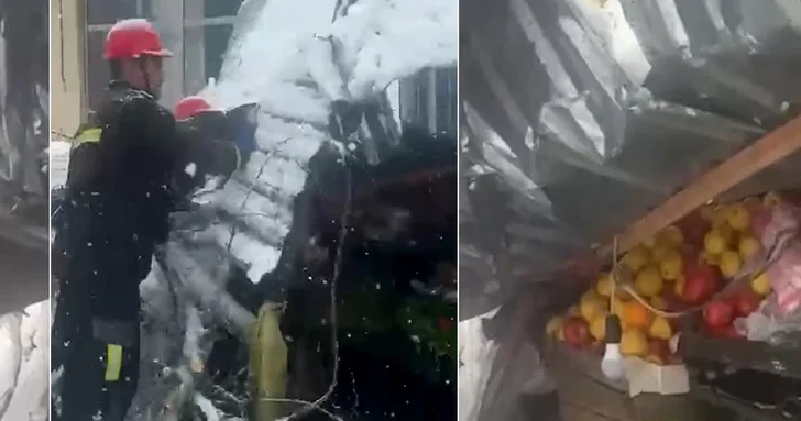 В Джалилабаде дерево упало на магазин, есть пострадавшая