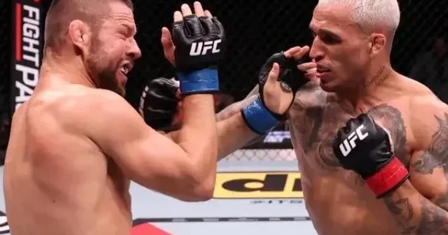 Rio da dramatik UFC döyüşü: Çarlz Oliveyra boğucu fəndlə qalib gəldi