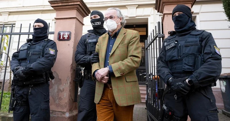 Reichsbürger hərəkatının üzvü Merkel və Şoltsa sui qəsd çağırışı etdiyinə görə həbs edilib