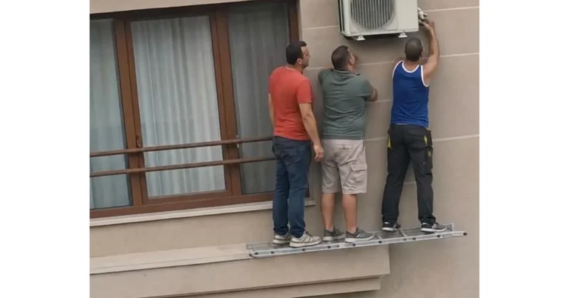 Ustaların təhlükəli kondisioner quraşdırması müzakirə yaradıb: Ölümlə oyun oynadılar VİDEO