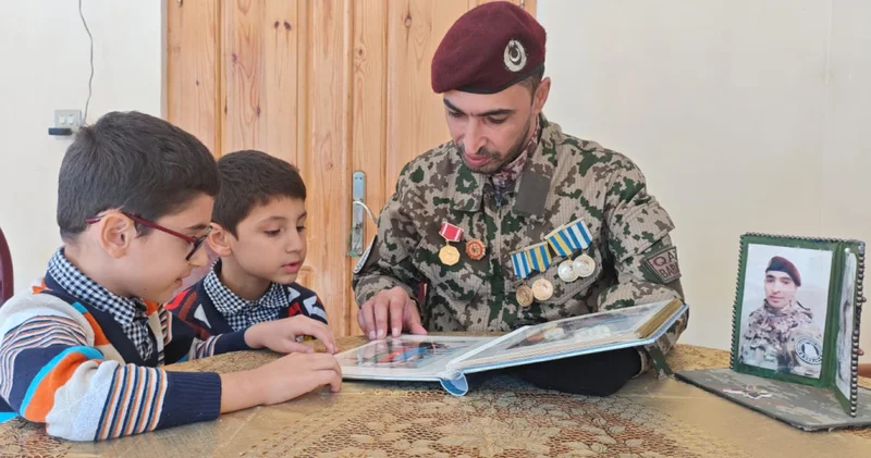 Güllə mənə dəyərək çıxıb onun boğazına girmişdi... Murov döyüşlərinin qəhrəmanı