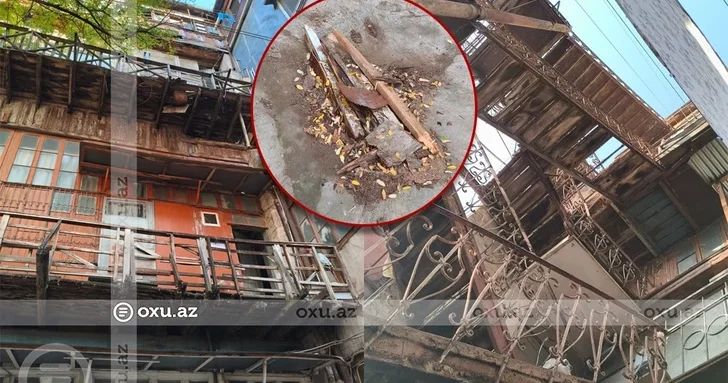 Опасная ситуация в Ясамальском районе: элементы фасада здания отрываются и падают на землю