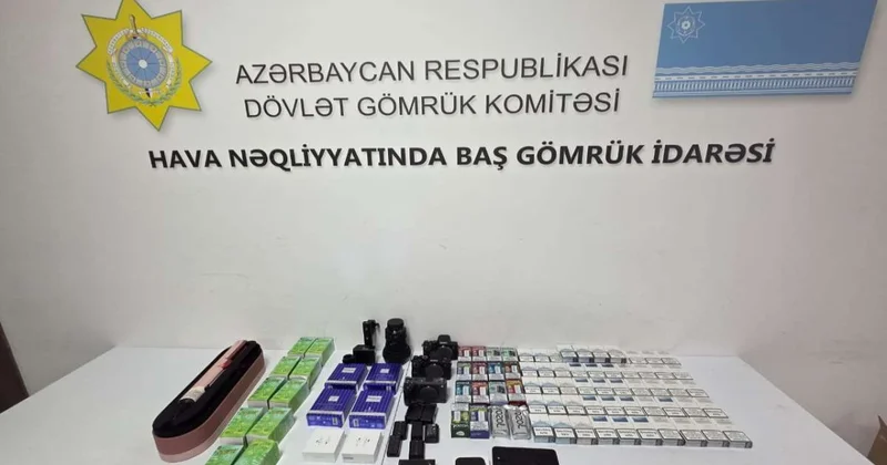 Mobil telefonda gizlədilmiş qızıl külçələr aşkarlanıb