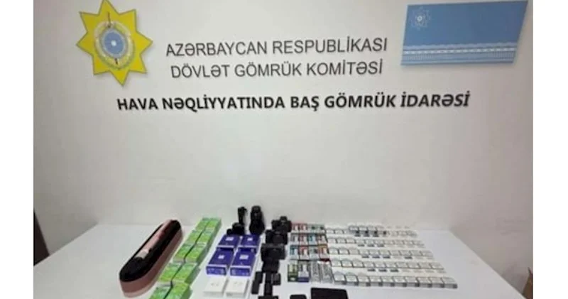 Telefonun içərisində gömrükdən qızıl külçələr keçirmək istədilər FOTOLAR