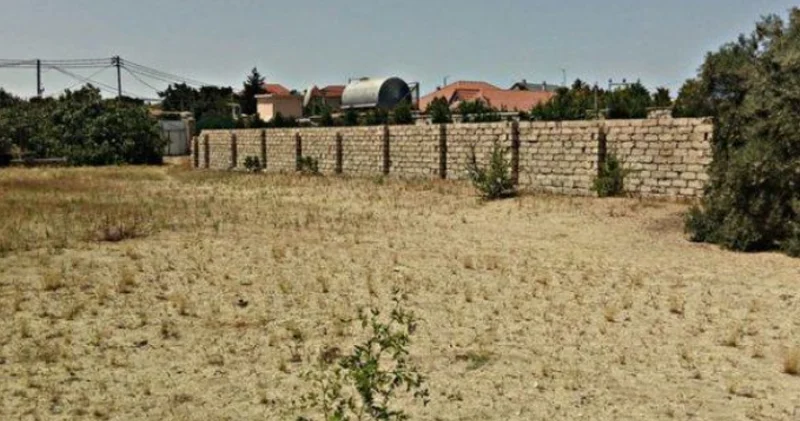 Borcunu ödəmək üçün dələduzluq etdi, başqasının torpağını satışa çıxardı