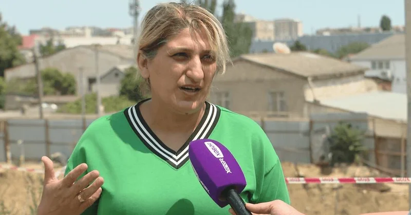 Bakı sakini tikinti şirkəti tərəfindən evinə ziyan vurulduğunu iddia edir (Video)