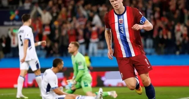 Haalanddan komanda yoldaşlarına burger qonaqlığı Şəkil