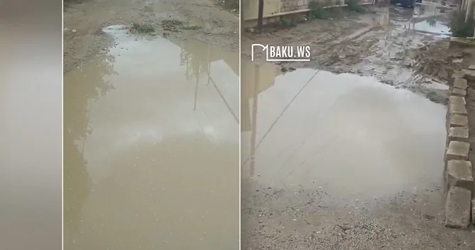 Bakıda yol gölməçəyə çevrildi
