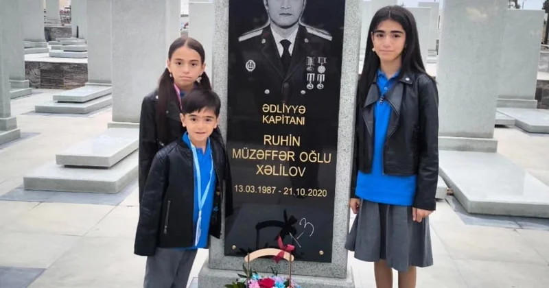 Şəhid oğlu 1 ci sinfə atasının məzarı yanından getdi FOTO