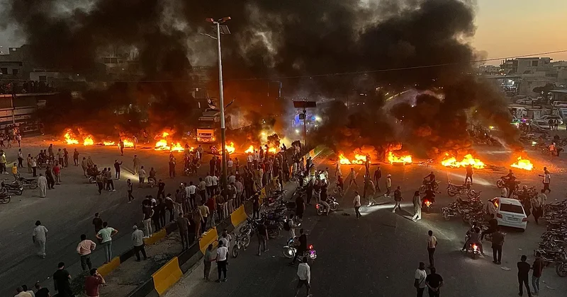 Suriyalılar Əsədi istəyir