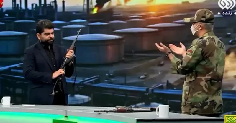 Aparıcı canlı yayımda “Kalaşnikov”dan atəş açdı Video