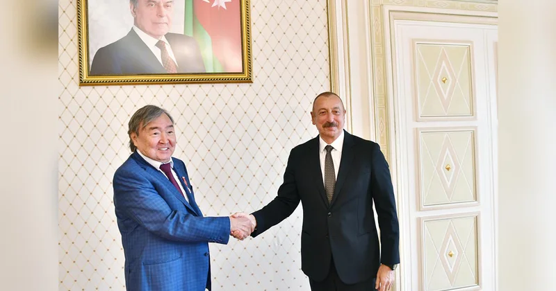 Prezident Oljas Süleymenovu təbrik etdi