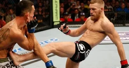 UFC də ilin revanşı: Makqreqor və Hollouey 13 ildən sonra yenidən üz üzə