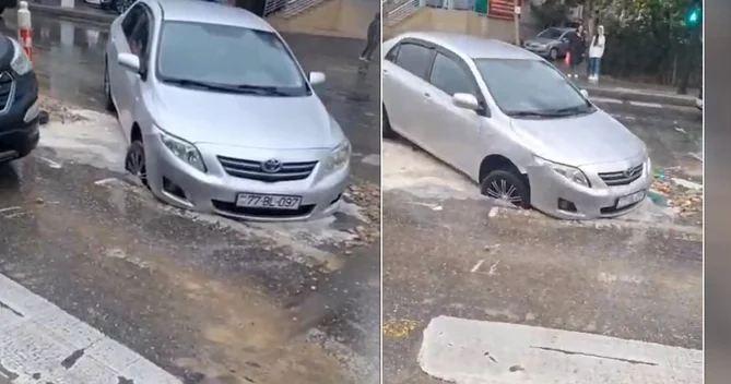 Bakıda maşın yolda qazılmış çuxura düşüb
