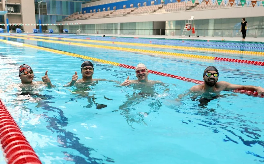 Azərbaycanın üçqat paralimpiya çempionu gənc idmançılarla görüşüb FOTOLAR