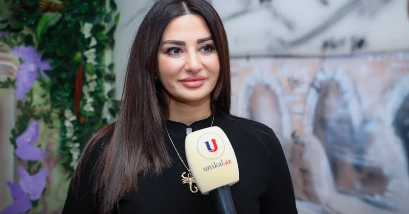 Dağıdılmış divarları danışdıran rəssam... VİDEO