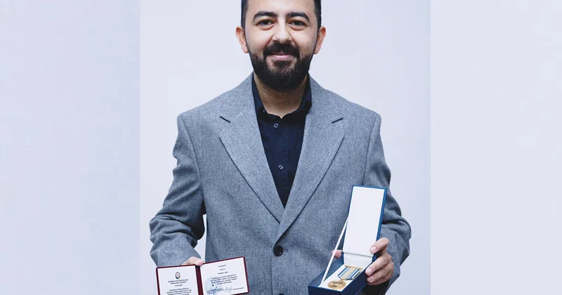 OLAY ın baş redaktoru təltif olundu